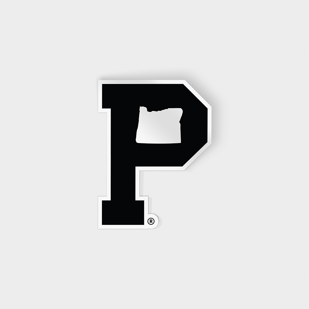 The "P" Sticker - Black features a large black letter 'P' set against a white background, with the shape of Oregon creatively cut out in the top right section of the letter. Printed with UV ink for enhanced durability, this design also includes a registered trademark symbol positioned at the bottom right of the 'P'.