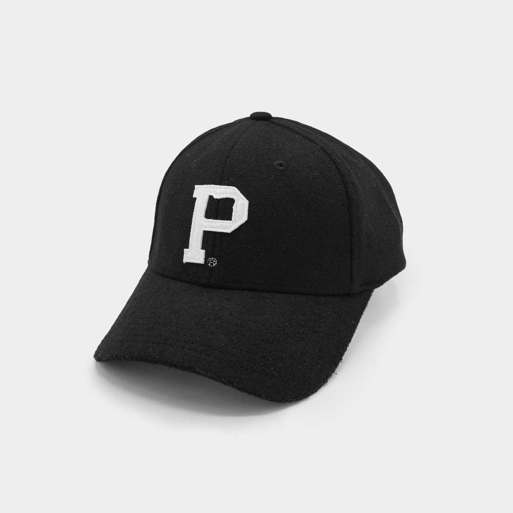 A Portland "P" Cap - Classic in black featuring a white, uppercase letter "P" embroidered on the front. The cap has a curved brim and appears to be made of soft fabric with vintage strap hat styling, set against a plain white background.
