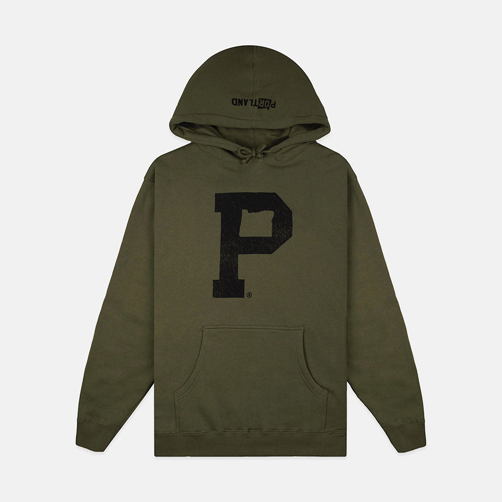 The Soft-Blend "P" Hoodie in olive showcases a large black letter "P" on the chest. It features a front pocket, long sleeves, and a visible drawstring at the neck. The inside of the hood is printed with "PORTLAND" in black lettering. Displayed against a white background, this stylish piece arrives in sustainable packaging.