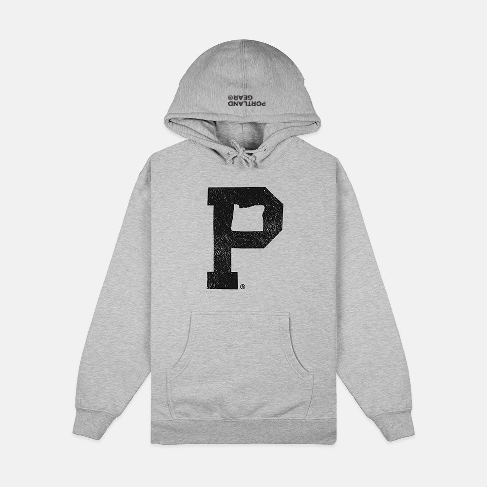 The Soft-Blend "P" Hoodie - Grey features a large black letter "P" printed on the chest, with the text "Portland Gear" adorning the edge of the hood. It also includes a front pouch pocket and drawstrings for adjustable comfort.