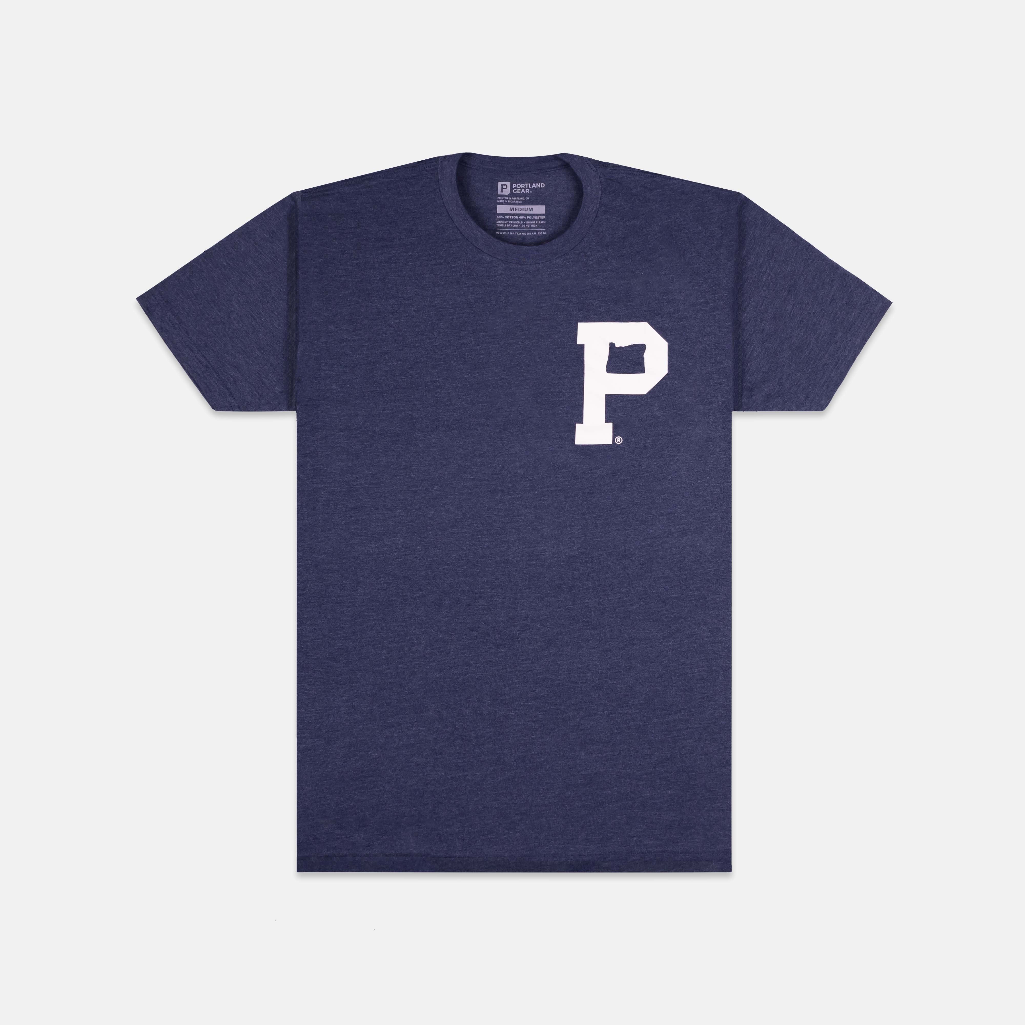 A Soft-Blend "P" Tee - Classic in heather navy, featuring a white letter "P" printed on the left chest, emblematic of the Portland Gear tee collection. The shirt is displayed on a plain, light grey background.