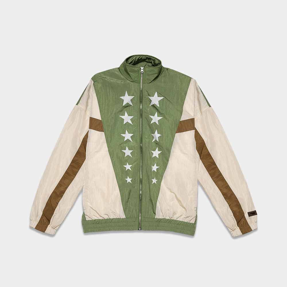 Displayed against a white background is the Olympic Summit Track Jacket, featuring a green, beige, and brown color-block design. The front boasts a vertical row of white stars along the middle of the green section, capturing the spirit of the 2024 Olympics. Beige sleeves with brown stripes running down their sides complete this striking look.